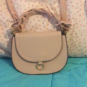 Kayla & Ava pink pocketbook, braided handle with strap.